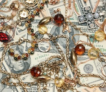 Jewelry Laying on Cash Jewelry Laying on Cash